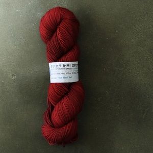 Blue Moon Fiber Arts Socks that Rock Lightweight Yarn in True Blood Red Color